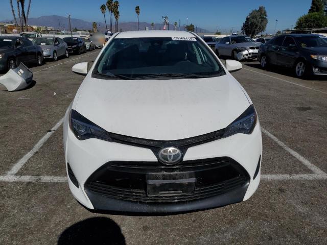 VIN 5YFBURHE1HP736996 2017 Toyota Corolla, L no.5