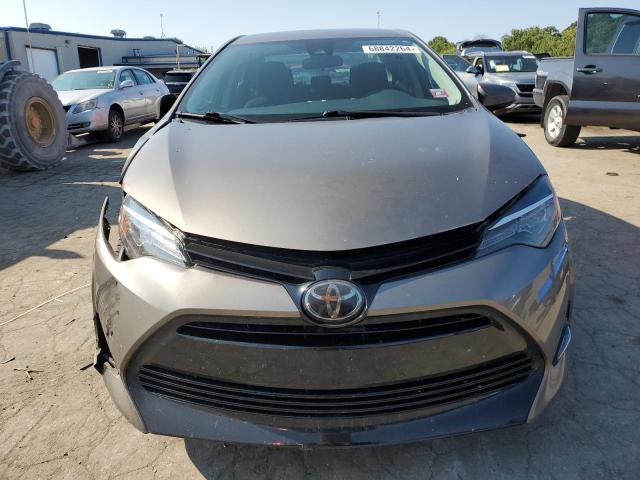 VIN 5YFBURHEXJP763264 2018 Toyota Corolla, L no.5