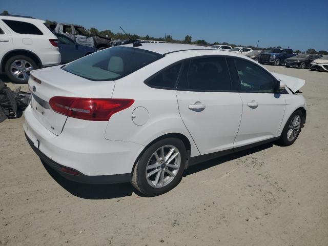 VIN 1FADP3F24FL300807 2015 Ford Focus, SE no.3