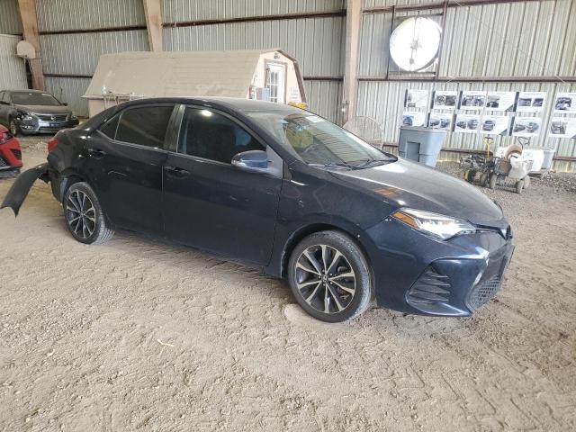 VIN 5YFBURHE1KP863822 2019 Toyota Corolla, L no.4