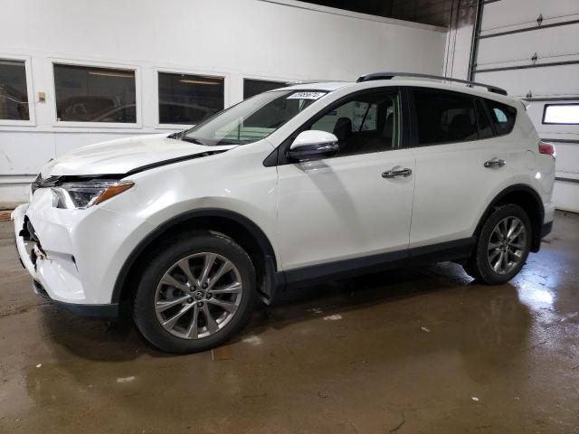 VIN JTMDFREV6JD236347 2018 Toyota RAV4, Limited no.1