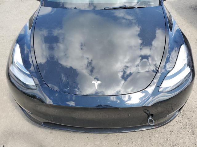 VIN 7SAYGDEE4PA036974 2023 Tesla MODEL Y no.11