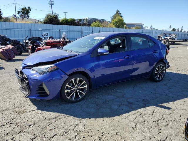 VIN 5YFBURHE9HP679544 2017 Toyota Corolla, L no.1