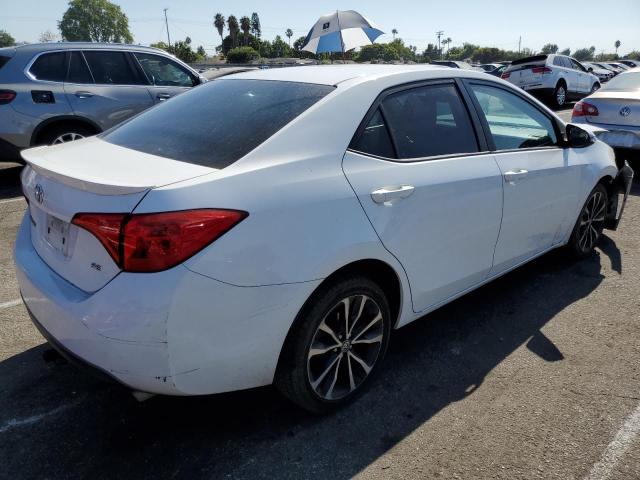 VIN 5YFBURHE1HP691784 2017 Toyota Corolla, L no.3