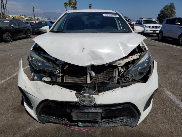 VIN 5YFBURHE1HP691784 2017 Toyota Corolla, L no.5