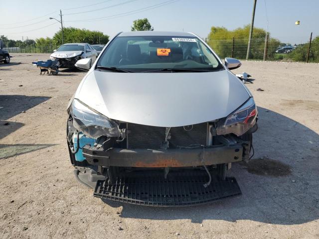 VIN 5YFBURHEXHP597113 2017 Toyota Corolla, L no.5