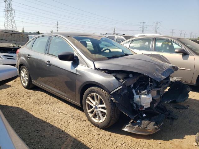 VIN 1FADP3F23JL215448 2018 Ford Focus, SE no.4