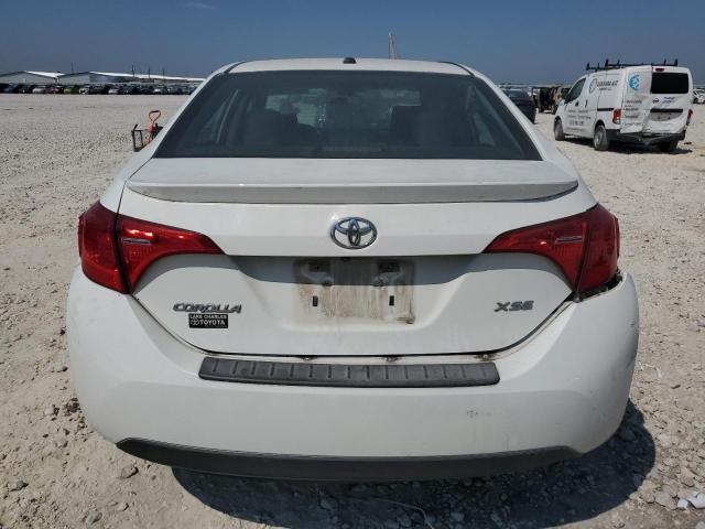 VIN 5YFBURHE3HP613054 2017 Toyota Corolla, L no.6