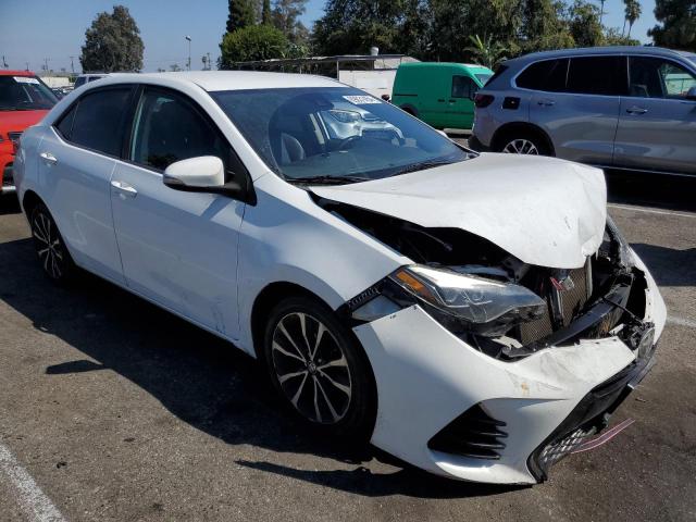 VIN 5YFBURHE1HP691784 2017 Toyota Corolla, L no.4