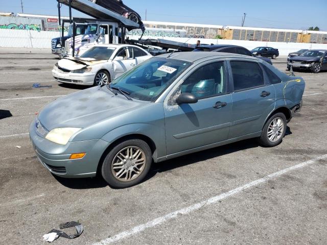 FORD FOCUS ZX4 2005 beige sedan 4d gas 1FAFP34N35W247133 photo #1