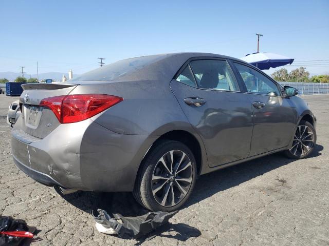 VIN 5YFBURHE3JP786286 2018 Toyota Corolla, L no.3