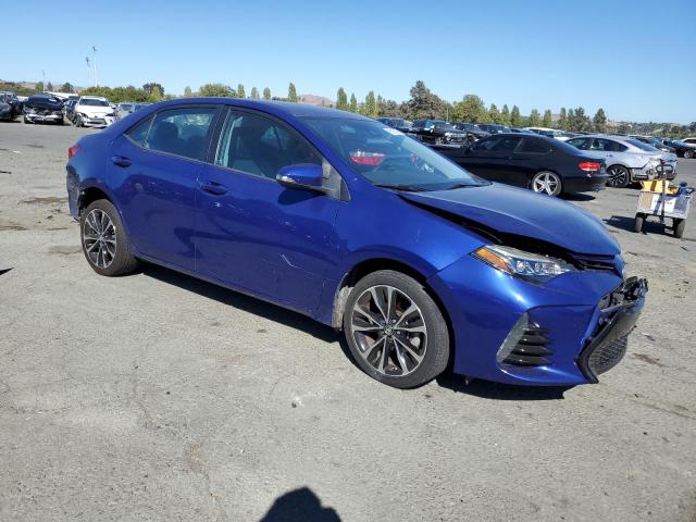 VIN 5YFBURHE9HP679544 2017 Toyota Corolla, L no.4