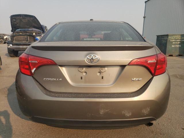 VIN 5YFBURHE5JP851221 2018 Toyota Corolla, L no.6