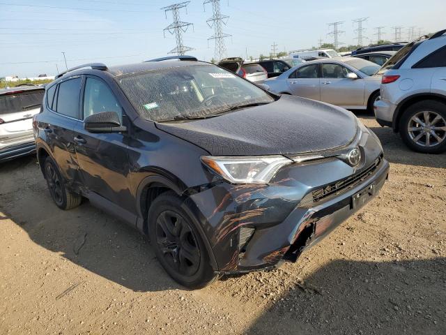 VIN JTMBFREV7HJ170779 2017 Toyota RAV4, LE no.4