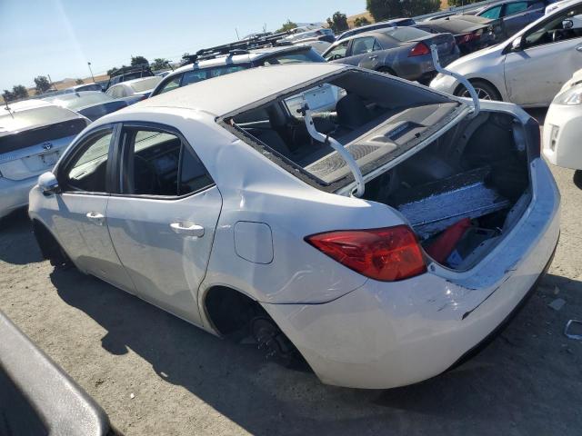 VIN 5YFBURHE9HP669239 2017 Toyota Corolla, L no.2