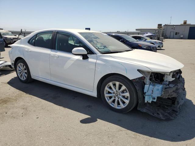 VIN 4T1B11HK5KU850487 2019 Toyota Camry, L no.4