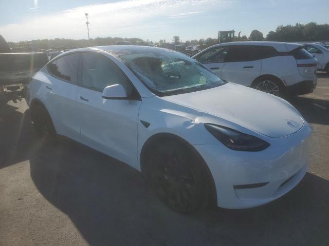 VIN 7SAYGAEEXPF664569 2023 Tesla MODEL Y no.4