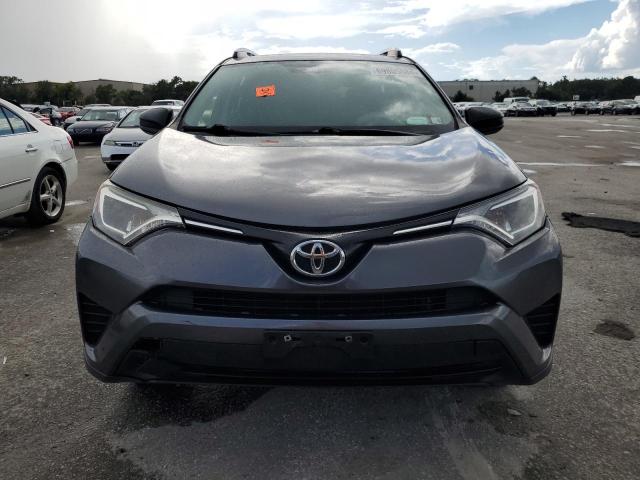 VIN JTMBFREV8GJ056014 2016 Toyota RAV4, LE no.5