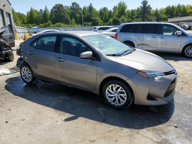 VIN 5YFBURHE5JP825394 2018 Toyota Corolla, L no.4