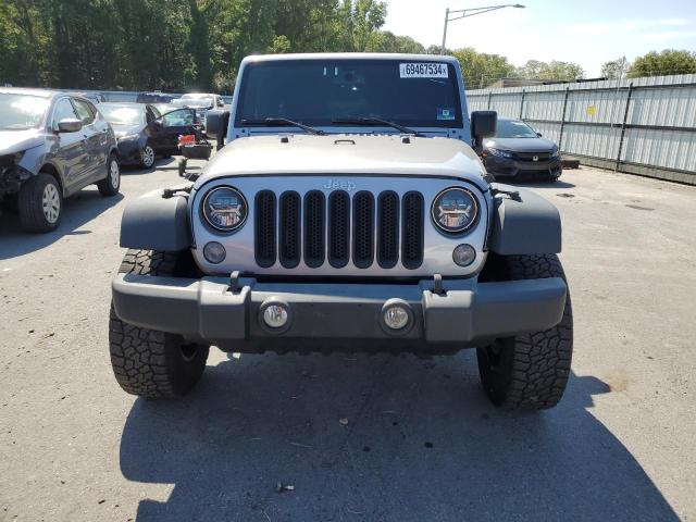 VIN 1C4HJWDG9GL161496 2016 Jeep Wrangler, Sport no.5