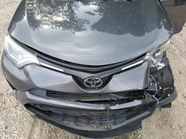 VIN JTMZFREV9JJ731665 2018 Toyota RAV4, LE no.12