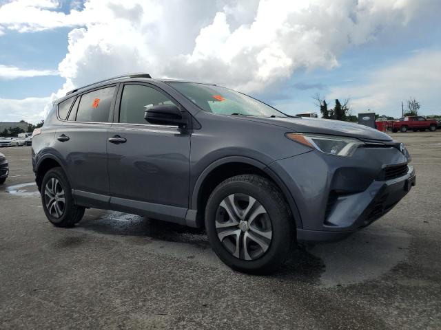 VIN JTMBFREV8GJ056014 2016 Toyota RAV4, LE no.4