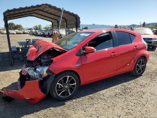 TOYOTA PRIUS C 2012 red  hybrid engine JTDKDTB37C1000355 photo #1