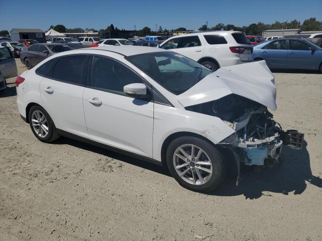 VIN 1FADP3F24FL300807 2015 Ford Focus, SE no.4