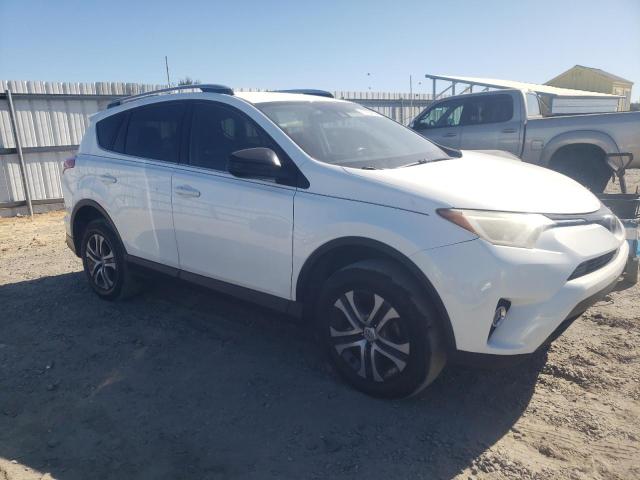 VIN JTMZFREV8JJ201302 2018 Toyota RAV4, LE no.4