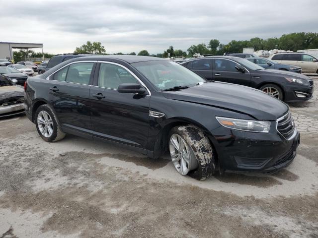 VIN 1FAHP2D8XGG104769 2016 Ford Taurus, SE no.4