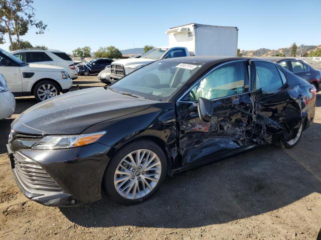 VIN 4T1B21HK6KU515218 2019 Toyota Camry, Hybrid no.1