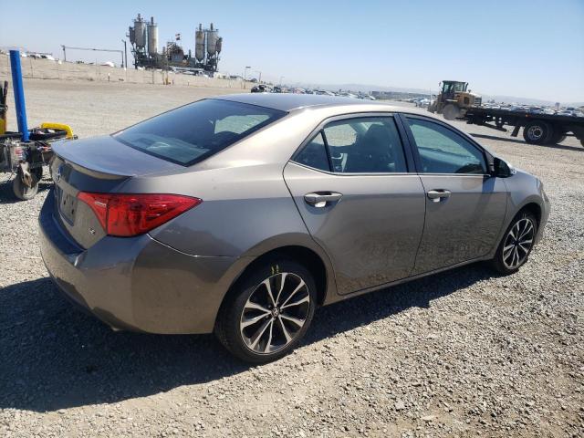 VIN 5YFBURHE3JP738772 2018 Toyota Corolla, L no.3