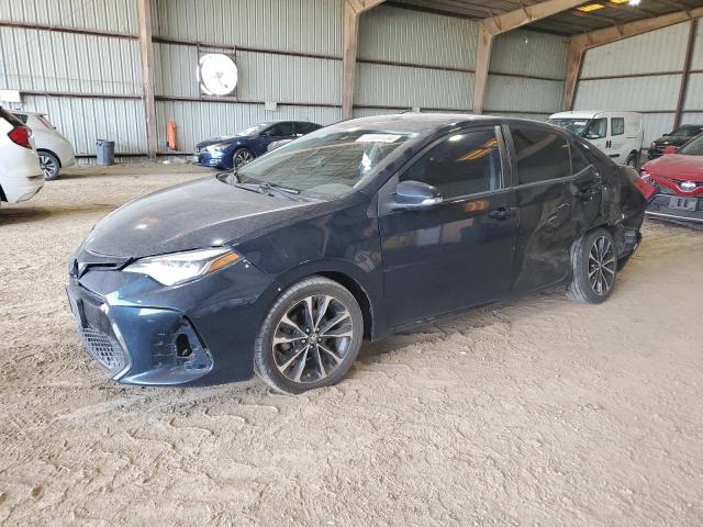 VIN 5YFBURHE1KP863822 2019 Toyota Corolla, L no.1