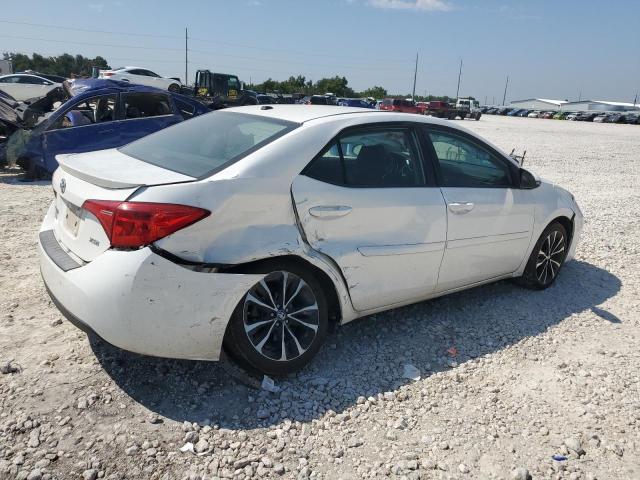 VIN 5YFBURHE3HP613054 2017 Toyota Corolla, L no.3