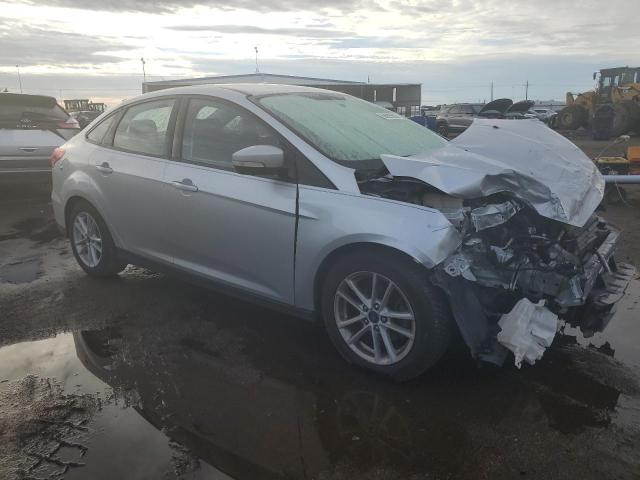 VIN 1FADP3F27HL340804 2017 Ford Focus, SE no.4