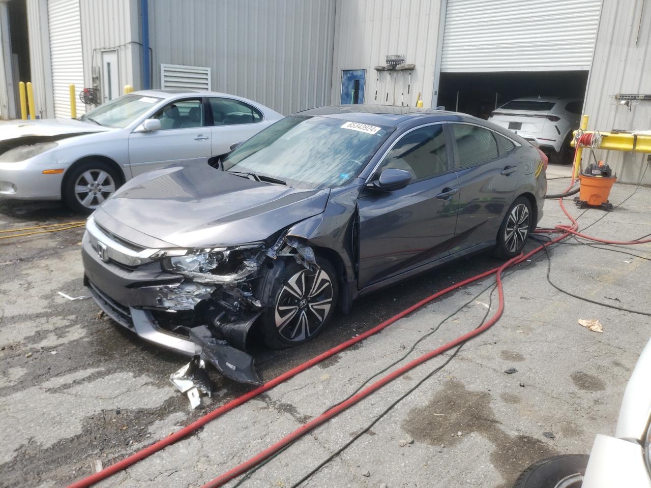 JHMFC1F79JX015616 HONDA CIVIC EXL 2018
