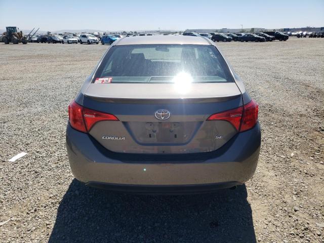 VIN 5YFBURHE3JP738772 2018 Toyota Corolla, L no.6