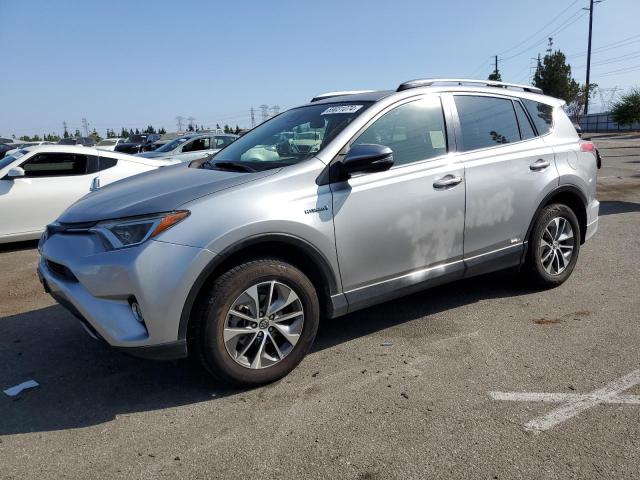 TOYOTA RAV4 HV LE 2018 silver  hybrid engine JTMRJREV9JD189092 photo #1