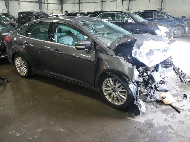 2015 FORD FOCUS TITA 1FADP3J28FL324308