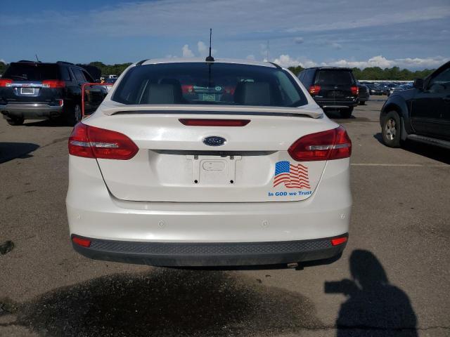 2015 FORD FOCUS TITA 1FADP3J21FL237706