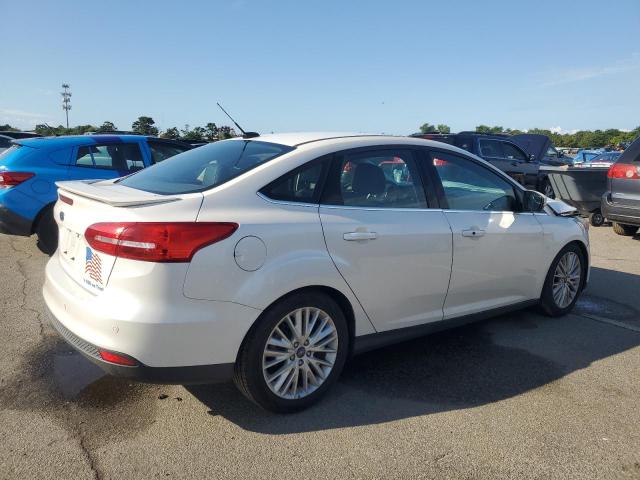 2015 FORD FOCUS TITA 1FADP3J21FL237706