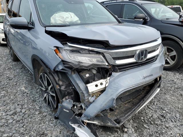 2022 HONDA PILOT TOUR 5FNYF6H66NB506549