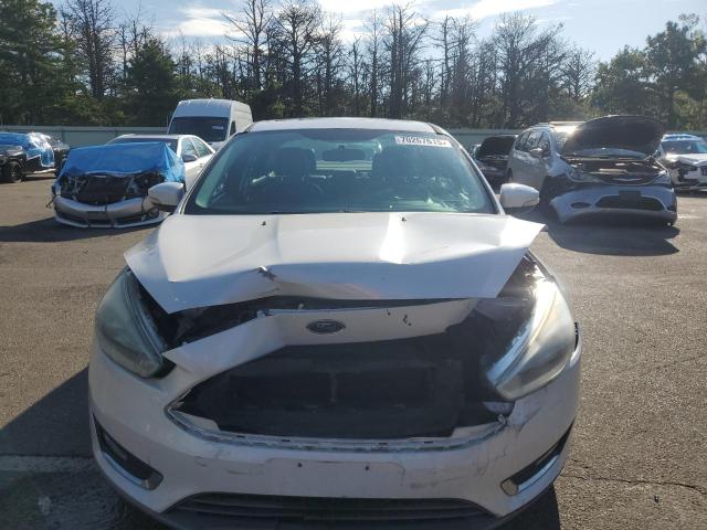 2015 FORD FOCUS TITA 1FADP3J21FL237706