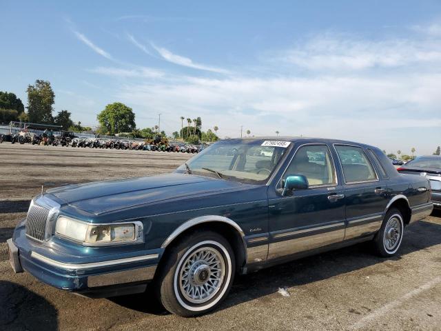 LINCOLN TOWN CAR E 1997 green  gas 1LNLM81W6VY679389 photo #1