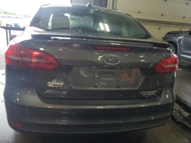 2015 FORD FOCUS TITA 1FADP3J28FL324308