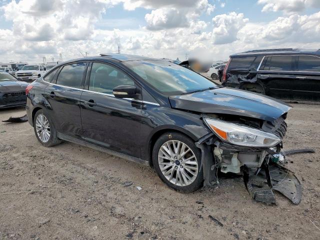 2015 FORD FOCUS TITA 1FADP3J28FL386663