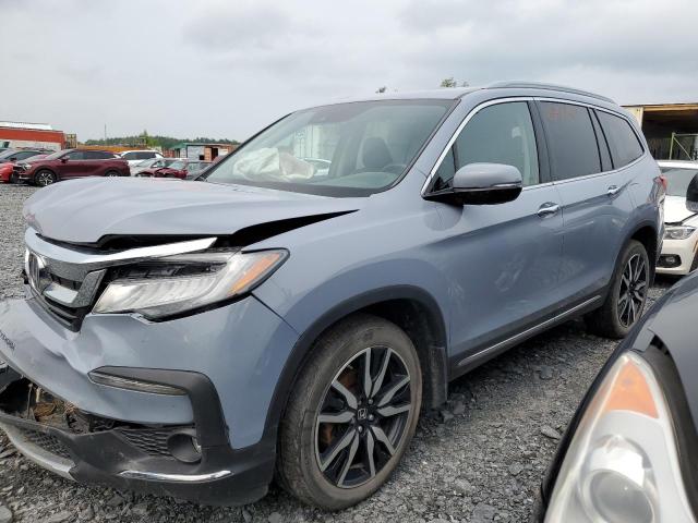 2022 HONDA PILOT TOUR 5FNYF6H66NB506549