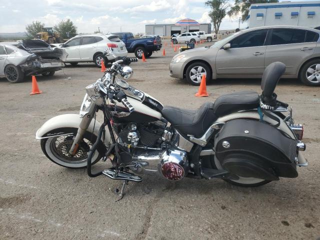2011 HARLEY-DAVIDSON FLSTN 1HD1JD510BB047996