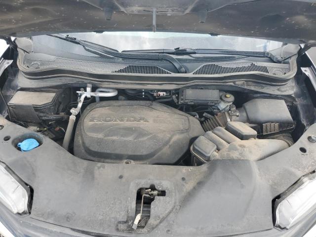 2021 HONDA PASSPORT TOURING - 5FNYF8H93MB028255