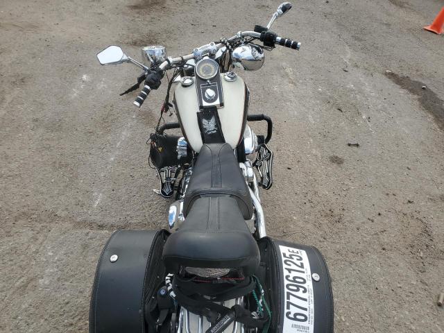 2011 HARLEY-DAVIDSON FLSTN 1HD1JD510BB047996